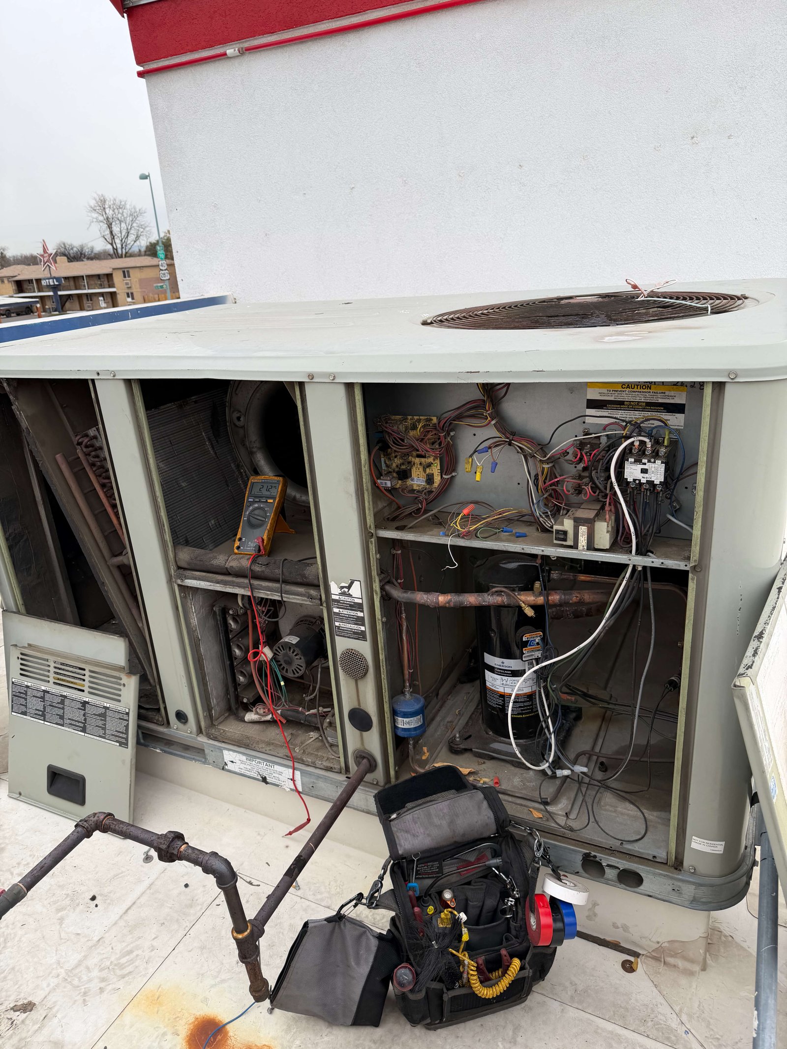 Air conditioner repair service in Denver fixing residential AC unit